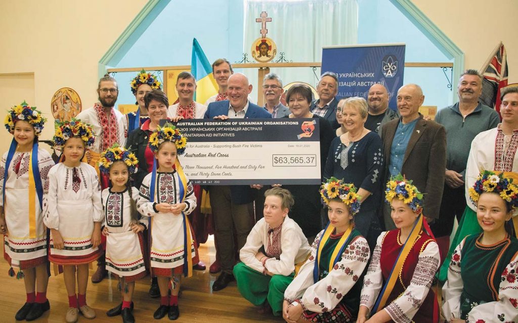 The Australian Federation of Ukrainian Organizations presenting the Australian Red Cross with a check for bushfire relief