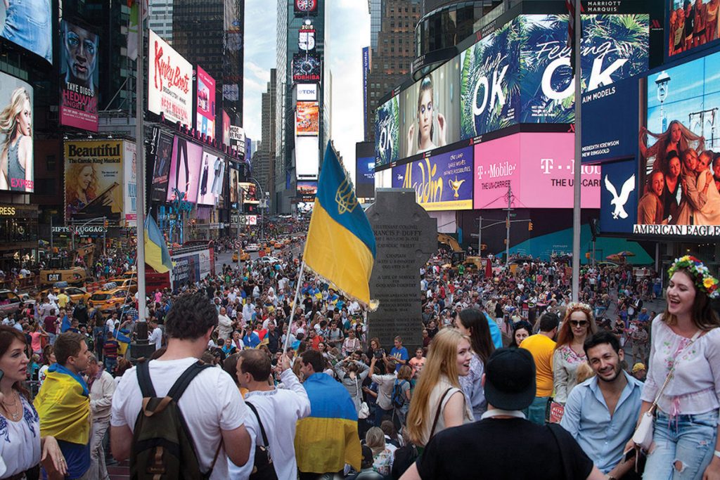 NEW YORK – Ukrainian Americans, representatives of several waves of immigration from Ukraine and their progeny, filled New York’s Times Square with the blue and yellow colors of Ukraine’s national flag and beautiful Ukrainian embroidery in celebration of the 24th anniversary of the renewal of Ukraine’s independence. They came together as a flashmob on the evening of August 23, carrying Ukrainian flags and banners, singing Ukrainian songs and the national anthem of Ukraine, and greeting each other with the words “Glory to Ukraine – glory to the heroes.” Among those demonstrating their Ukrainian pride was Ukraine’s ambassador to the United Nations, Yuriy Sergeyev, attending in an unofficial capacity. (For photos and information about more community celebrations of Ukrainian Independence Day, see pages 14-15.)