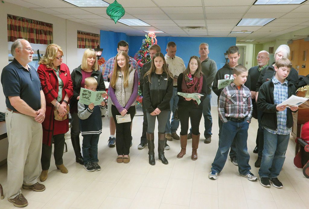 HILLSIDE, N.J. – Carolers from Immaculate Conception Ukrainian Catholic Church in Hillside, N.J., (seen above) visited the retired Sisters of Mercy and clergy at McAuley Hall on the campus of Mount St. Mary Academy in Watchung, N.J., on Saturday, December 26, 2015. The carolers sang Christmas carols in Ukrainian and English. This year, the carolers had the privilege of presenting the retired sisters and clergy with the Bethlehem Peace Light, which is shared by scouts, including Plast Ukrainian Scouting Organization, around the world during the Christmas season. The parish carolers also visited parishioners in their homes and nursing homes throughout Union, Morris, Somerset and Middlesex counties.
