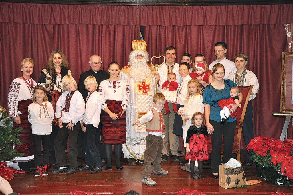 WOONSOCKET, R.I. – Ukrainian National Association Branch 241 of Woonsocket, R.I., hosted its annual St. Nicholas celebration for the children of St. Michael Ukrainian Catholic Church on Sunday, December 7, 2015. Msgr. Roman Golemba greeted the youngsters. Lydia Zuk-Klufas and Lydia Kusma Minyayluk planned the program performed by the children, which included a play, poems and musical entertainment. The parents prepared a delicious buffet luncheon. The highlight of the event was the arrival of St. Nicholas and his distribution of gifts to the children.